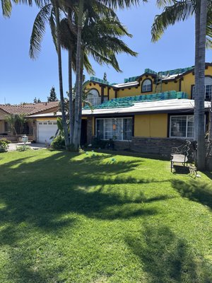 Alex's Top Roofing Logo