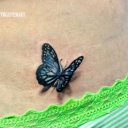 Exquizeet Tattoo & Piercing Studio - 3D butterfly  Tattooed by Amy