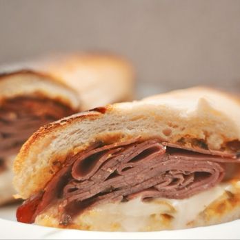 West Coast Sourdough - Pastrami Sandwich. Warm, savory layers of pastrami meat, house sauce, & provolone cheese. The sourdough bread had a mild tang & sturdy chew. - Sandwiches Near Me - Norco, California West Coast Sourdough - Pastrami Sandwich. Warm, savory layers of pastrami meat, house sauce, & provolone cheese. The sourdough bread had a mild tang & sturdy chew. - Sandwiches Near Me - Norco, California