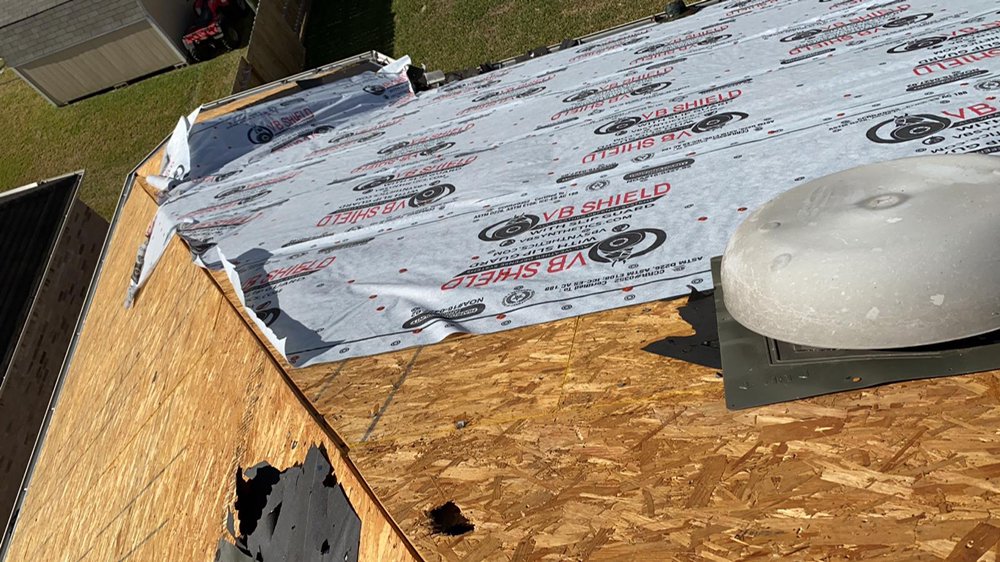 Slide of Top Shield Roofing