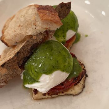 Jack's Wife Freda - Poached Eggs with Roasted Tomato and Halloumi - Mediterranean Near Me - New York, New York Jack's Wife Freda - Poached Eggs with Roasted Tomato and Halloumi - Mediterranean Near Me - New York, New York