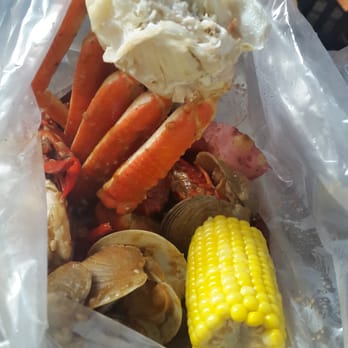 Claw Daddy's - Snow crab, clams & crawfish in claw daddy's special spicy sauce - Cajun/Creole Near Me - New York, New York