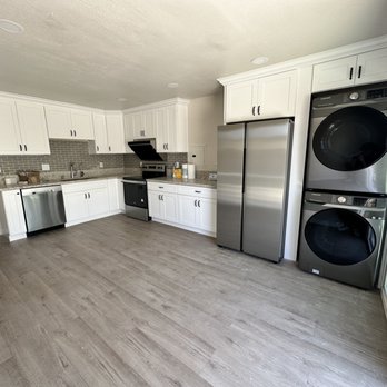 Top King Cabinets & Stone - a kitchen with a washer and dryer - Countertop Installation Near Me - South El Monte, California Top King Cabinets & Stone - a kitchen with a washer and dryer - Countertop Installation Near Me - South El Monte, California