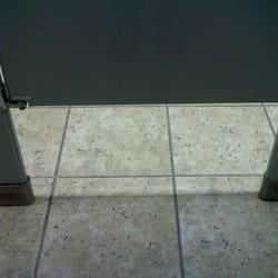Menards - For a place that sells flooring, you'd think they'd have something better in their own restrooms...