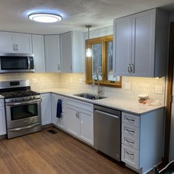 Truemark Construction - New kitchen with tile backsplash, and under lit cabinets