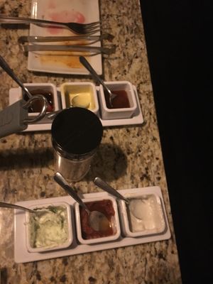 Photo of The Melting Pot - Greenville, SC, US. The sauces all come included.  The Gorgonzola cheese sauce (white one almost gone) was my favorite.