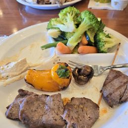 Steak kabob almost all gone and 1/2 chicken plate. Everything was great