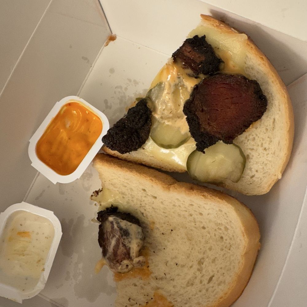 The Meltdown - Here is the full pic. Of my sandwich. 4 pieces of meat. Two pickles and sauce on one side of the bread. - Food Delivery Services Near Me - Seatac, Washington The Meltdown - Here is the full pic. Of my sandwich. 4 pieces of meat. Two pickles and sauce on one side of the bread. - Food Delivery Services Near Me - Seatac, Washington