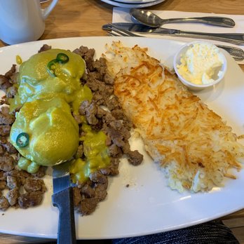 Broken Yolk Cafe - Border Benedict: bed of carne asada, sweet corn cakes with poached eggs topped with poblano sauce. YUMMMMMMEE!!!! - Breakfast & Brunch Near Me - Costa Mesa, California Broken Yolk Cafe - Border Benedict: bed of carne asada, sweet corn cakes with poached eggs topped with poblano sauce. YUMMMMMMEE!!!! - Breakfast & Brunch Near Me - Costa Mesa, California