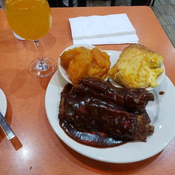 Amy Ruth's - Ri a with max and cheese, yams and a peach mimosa - Southern Near Me - New York, New York Amy Ruth's - Ri a with max and cheese, yams and a peach mimosa - Southern Near Me - New York, New York