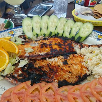 Taqueria Los Magueyes - Pescado Zarandeado (basically a grilled fish) with a spicy sauce on the side... Great dish to share. - Mexican Near Me - Bridgeview, Illinois Taqueria Los Magueyes - Pescado Zarandeado (basically a grilled fish) with a spicy sauce on the side... Great dish to share. - Mexican Near Me - Bridgeview, Illinois