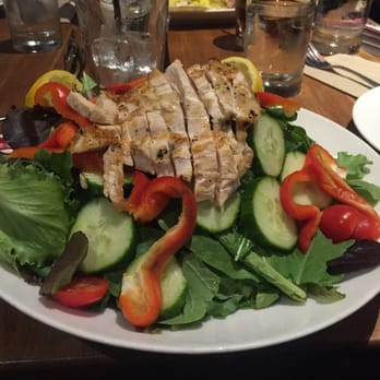 Earls Kitchen + Bar - Colossal grilled chicken green salad - Canadian (New) Near Me - Richmond, British Columbia Earls Kitchen + Bar - Colossal grilled chicken green salad - Canadian (New) Near Me - Richmond, British Columbia