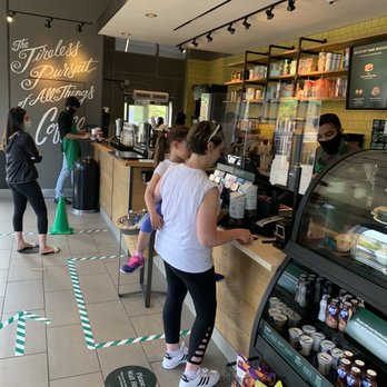 Starbucks - customers at the counter of a coffee shop - Coffee & Tea Near Me - Toronto, Ontario Starbucks - customers at the counter of a coffee shop - Coffee & Tea Near Me - Toronto, Ontario