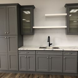 Grand Cabinets and Stone