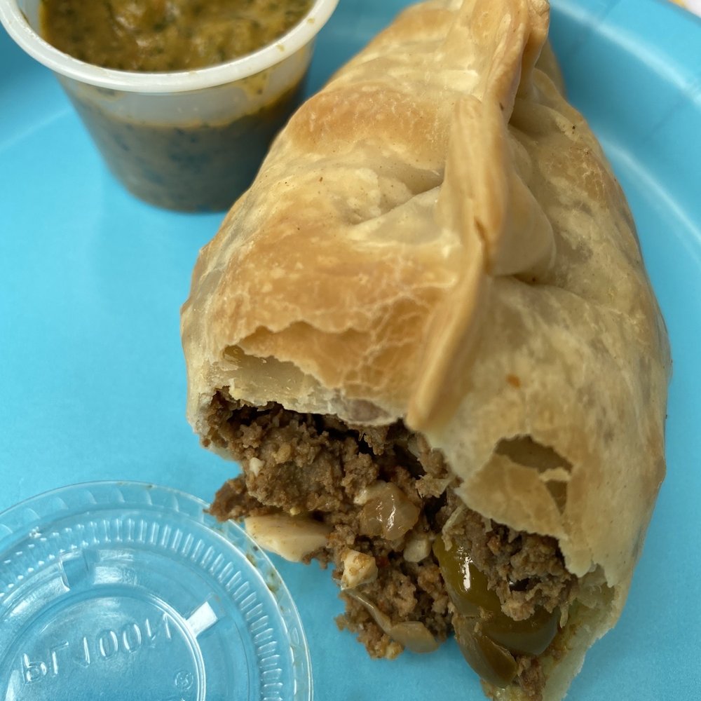 Empanada Fest - a plate of food and a cup of salsa - Food Trucks Near Me - Pawtucket, Rhode Island Empanada Fest - a plate of food and a cup of salsa - Food Trucks Near Me - Pawtucket, Rhode Island