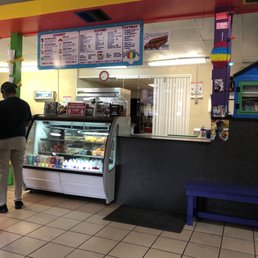 a man standing in front of a counter