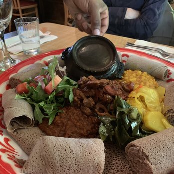 Abyssinian Kitchen - Our main dishes served on one single (BIG) plater. - Ethiopian Near Me - Portland, Oregon