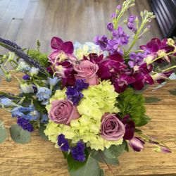 Flowers By Mike - Absolutely stunning arrangement by Maria for our childhood friend passing.  thank you for taking such great care of us.