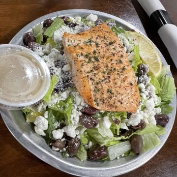 Blake's Backyard - Excellent Greek salad with a beautifully cooked plank of salmon on top. - Fruits & Veggies Near Me - Almont, Michigan