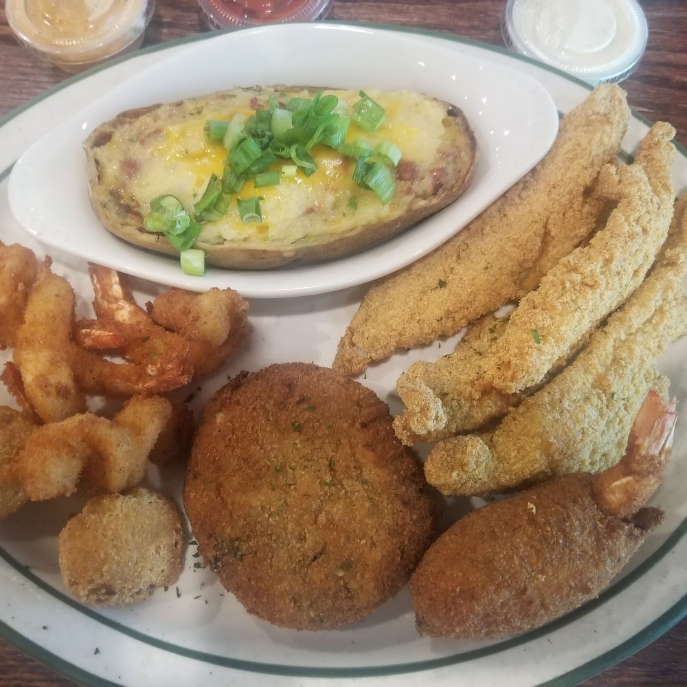 Floyds - Sugar Land - Floyd's platter - shrimp, hush puppies, fish fillets (unseasoned), crab stuffed shrimp, crab cake, stuffed potato (VERY GOOD) - Steakhouses Near Me - Sugar Land, Texas Floyds - Sugar Land - Floyd's platter - shrimp, hush puppies, fish fillets (unseasoned), crab stuffed shrimp, crab cake, stuffed potato (VERY GOOD) - Steakhouses Near Me - Sugar Land, Texas