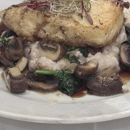 Sea bass with mashed potatoes, spinach, & mushrooms. The best sea bass we've ever had!