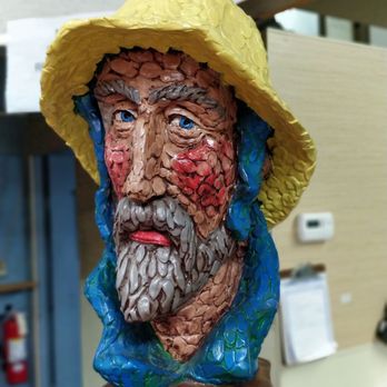 Huron Fish - a bust of a man wearing a hat - Seafood Markets Near Me - Saginaw, Michigan
