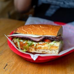 Darby Dan's Gourmet Sandwiches - Roast beef sandwich w/Swiss cheese $13.50 (1/2 view)