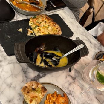 The Urban Oyster - Seafood flatbread, seafood pomodoro, moules frites - Seafood Near Me - Baltimore, Maryland