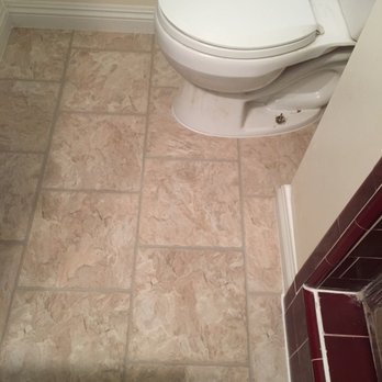 Interior Flooring Solutions - Bathroom.. they had to replace subfloor and installed molding - Flooring Near Me