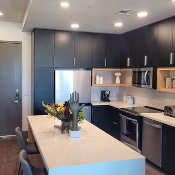 Live Grandscape - Kitchen has lots of cabinets but not sure how convenient the top shelves are you'd need a tall ladder to get things in/out. - Apartments Near Me - The Colony, Texas Live Grandscape - Kitchen has lots of cabinets but not sure how convenient the top shelves are you'd need a tall ladder to get things in/out. - Apartments Near Me - The Colony, Texas