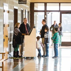 Fellowship Bible Church - Brentwood Campus - A family checks their children into our Learning Center