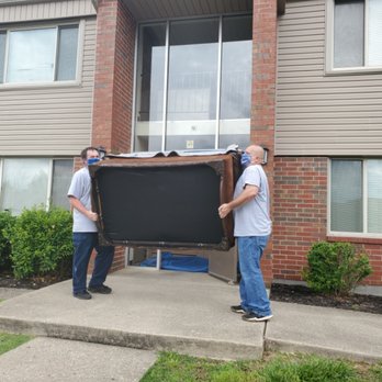 Cecil Movers - George and Jerry moving a couch. - Movers Near Me