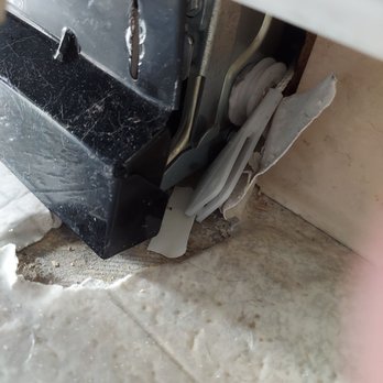 TNT Appliance - Door pulley removed and not reinstalled. Flooring damaged. - Appliances & Repair Near Me TNT Appliance - Door pulley removed and not reinstalled. Flooring damaged. - Appliances & Repair Near Me