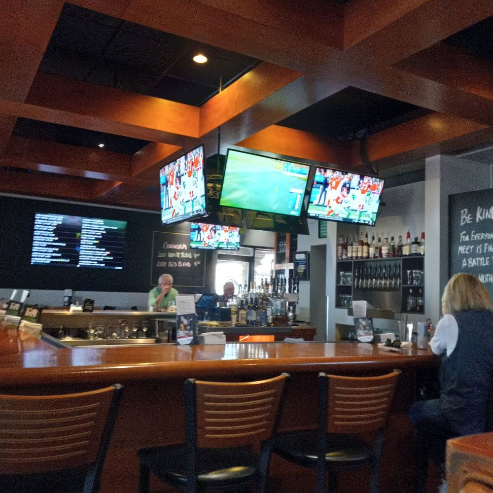 Keegan's Grill - a woman sitting at the bar - American Near Me - Phoenix, Arizona Keegan's Grill - a woman sitting at the bar - American Near Me - Phoenix, Arizona