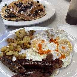 Bacon sausage home fries egg and pancake Bacon sausage home fries egg and pancake