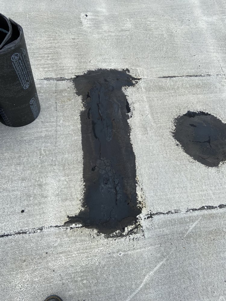 Slide of Mencho's Roofing & Repairs