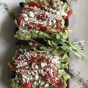 Tulum Art Club - Avocado toast- SO delicious!! So much flavor. Pretty filling too- I almost couldn't finish both slices. - Coffee & Tea Near Me - Tulum, ROO Tulum Art Club - Avocado toast- SO delicious!! So much flavor. Pretty filling too- I almost couldn't finish both slices. - Coffee & Tea Near Me - Tulum, ROO