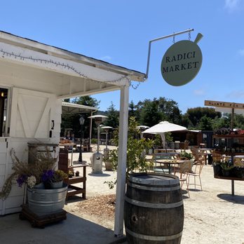 Radici Market - a white building with a sign that says radici market - Health Markets Near Me - Carmel, California Radici Market - a white building with a sign that says radici market - Health Markets Near Me - Carmel, California