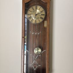 Don Karpen Antique Clock Repair - wall clock 44"x13" the hands does not move.  It still chimes when manually move   561-236-4446    How much to fix battery clock?