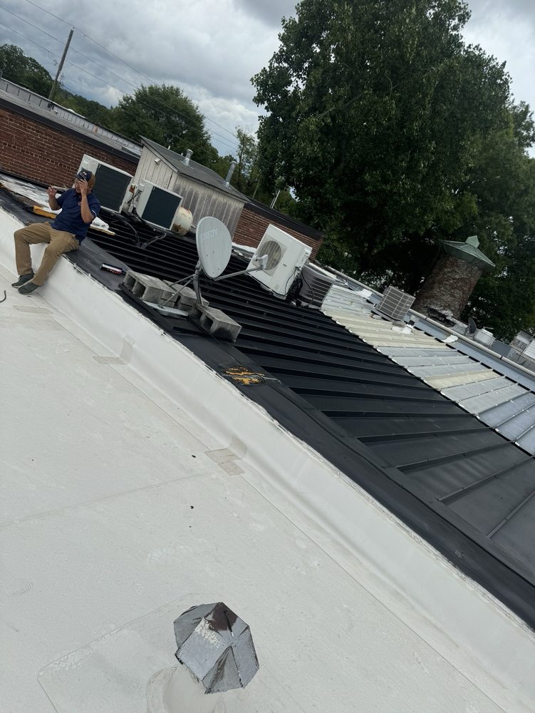 Slide of Mosaic Roofing Company