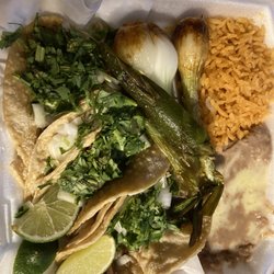 Las Fajitas - Carnitas tacos with rice & beans!