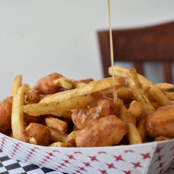 Roots 89 Grill - a basket of fried chicken and french fries - Burgers Near Me - Spring City, Utah