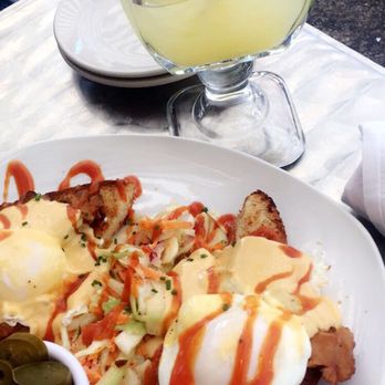 Mom's Kitchen & Bar - Tex Benedict with a big sized mimosa - Bars Near Me - Astoria, New York