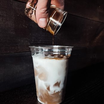 Rise Coffee - a person pouring coffee into a cup - Coffee & Tea Near Me - Marshfield, Missouri Rise Coffee - a person pouring coffee into a cup - Coffee & Tea Near Me - Marshfield, Missouri