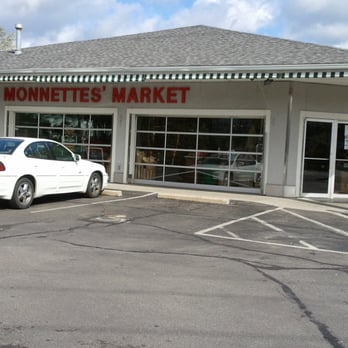 Monnette's Market - a white car parked in front of a store - Farmers Market Near Me - Toledo, Ohio