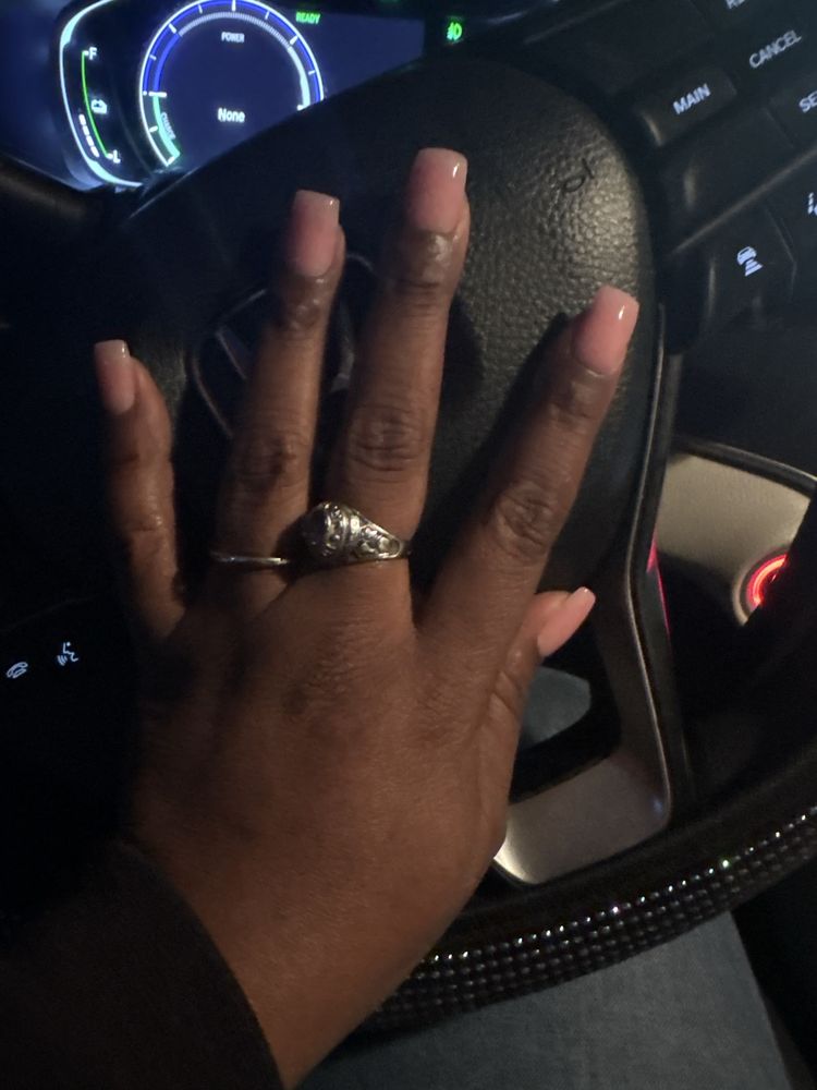 Sunny Nails & Spa Logo