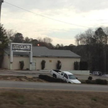 Wesley's Boobie Trap - a car in the middle of the road - Bars Near Me - Dora, Alabama Wesley's Boobie Trap - a car in the middle of the road - Bars Near Me - Dora, Alabama