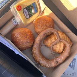 Chocolate croissants, butter croissant, pretzel, cheese, and chorizo. Chocolate croissants, butter croissant, pretzel, cheese, and chorizo.