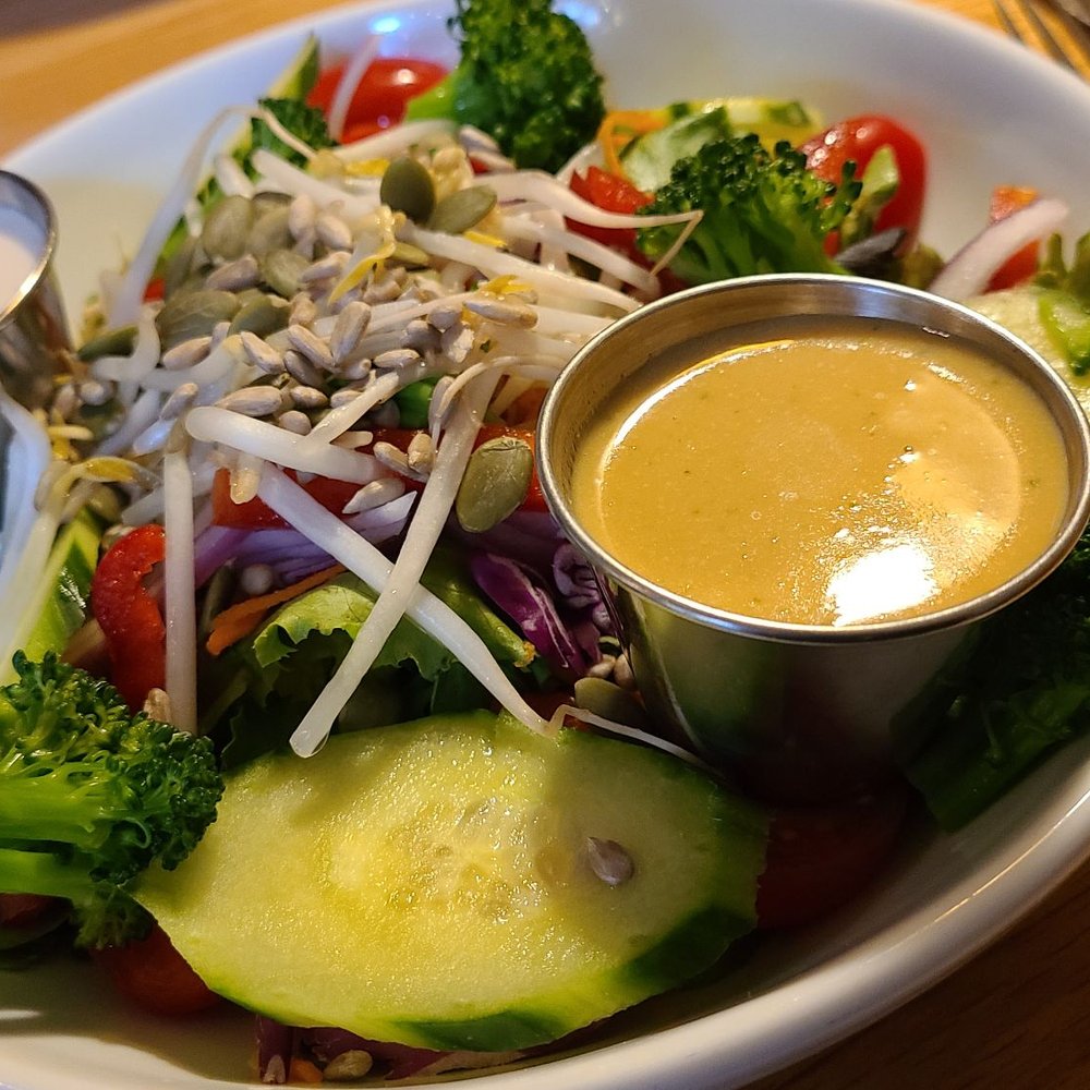 Laughing Seed Cafe - Small laughing seen salad Ginger sesame dressing Lemon tahini dressing - Vegetarian Near Me - Asheville, North Carolina