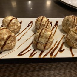 Stuffed mushrooms with sausage, cream cheese and a balsamic reduction.